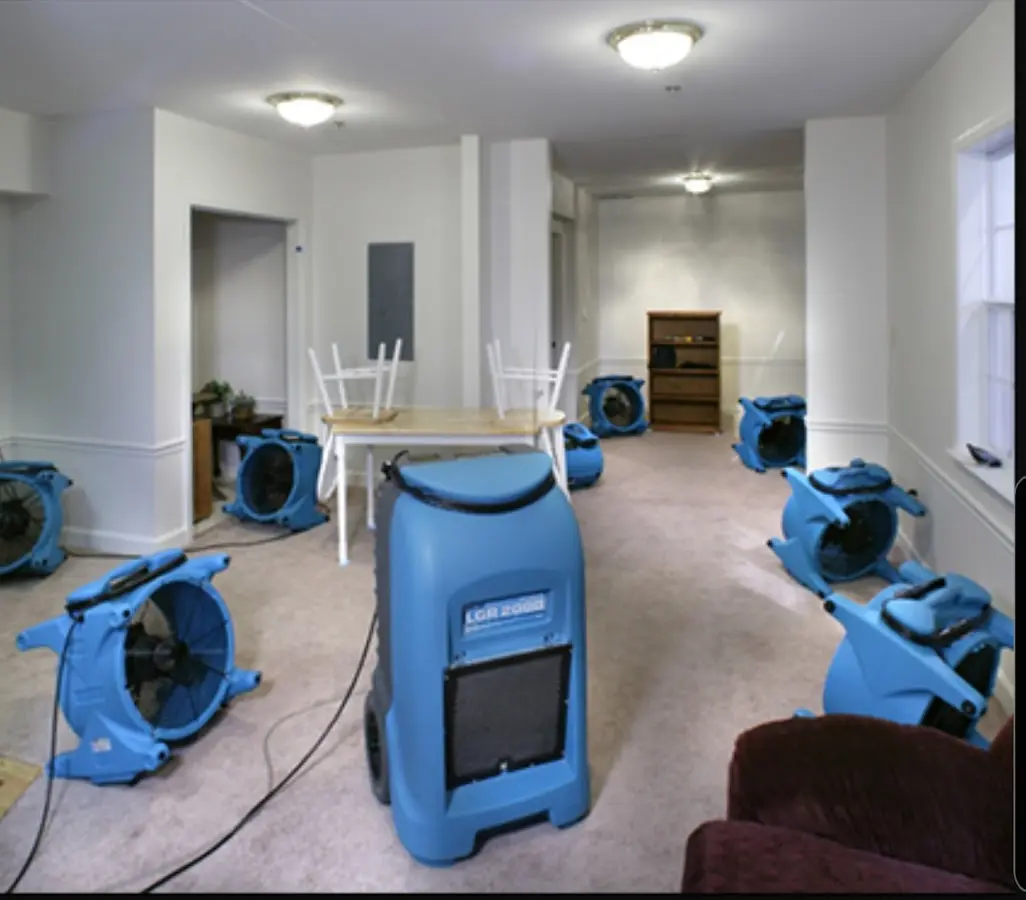 Air movers and dehumidifier setup for Water Extraction & Removal in Kronenwetter